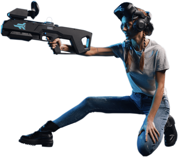 A woman holding a virtual reality gun at Zero Latency A woman holding a virtual reality gun at Zero Latency