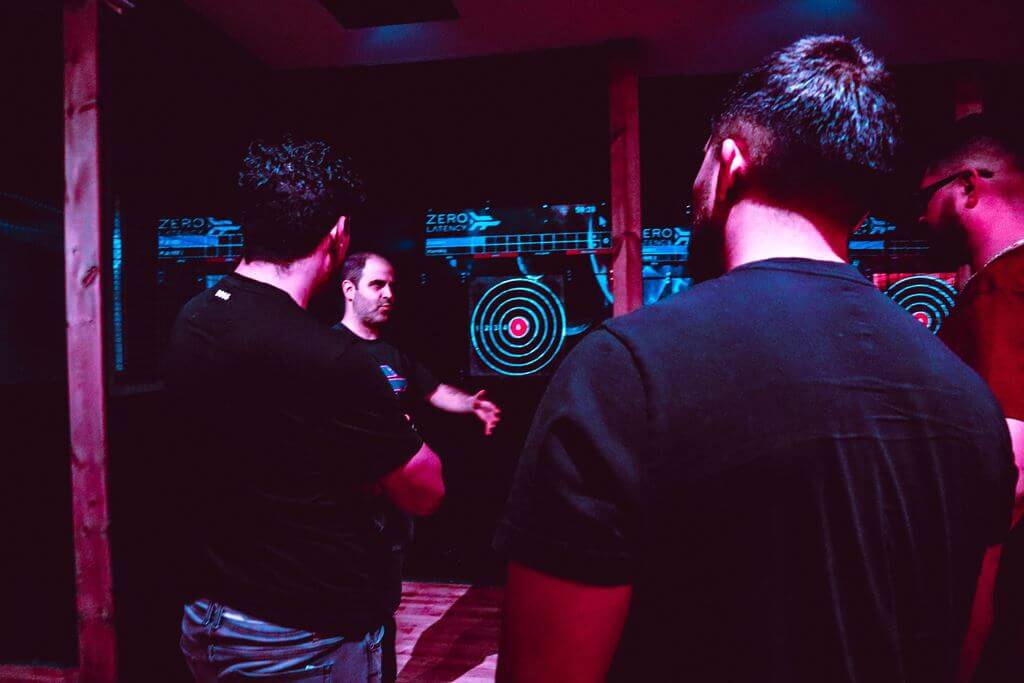 Group playing Axe Throwing at Zero Latency in Montreal
